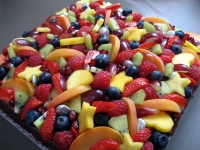 Chocolate cake decorated with fresh fruit